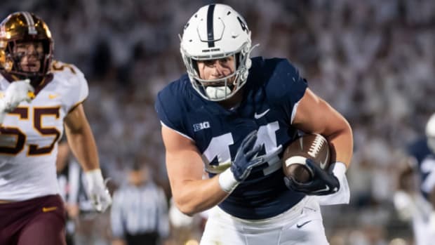 Penn State Nittany Lions tight end Tyler Warren catches a pass during a college football game in the Big Ten.